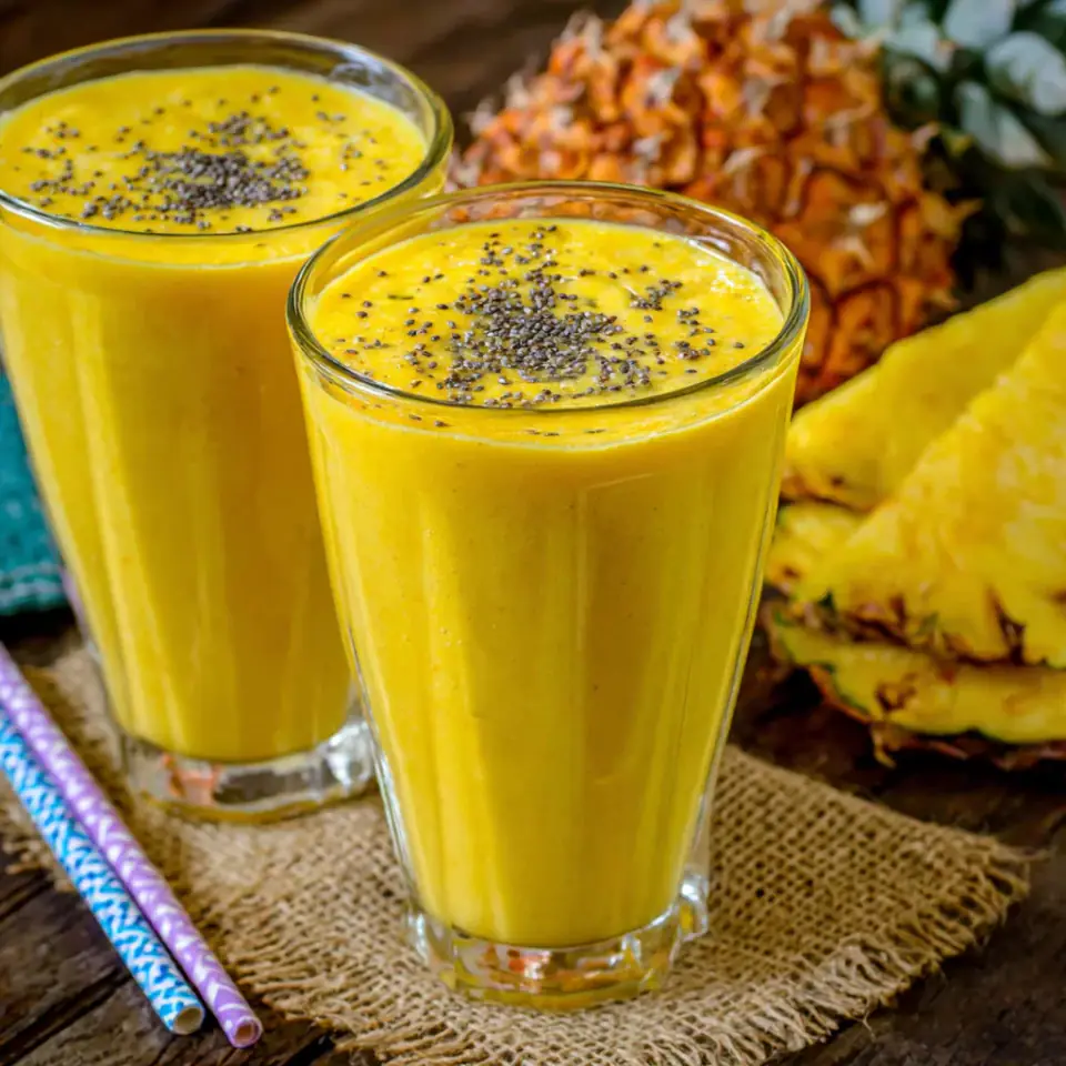 Anti-inflammatory Pineapple Banana Turmeric Smoothie served on the table