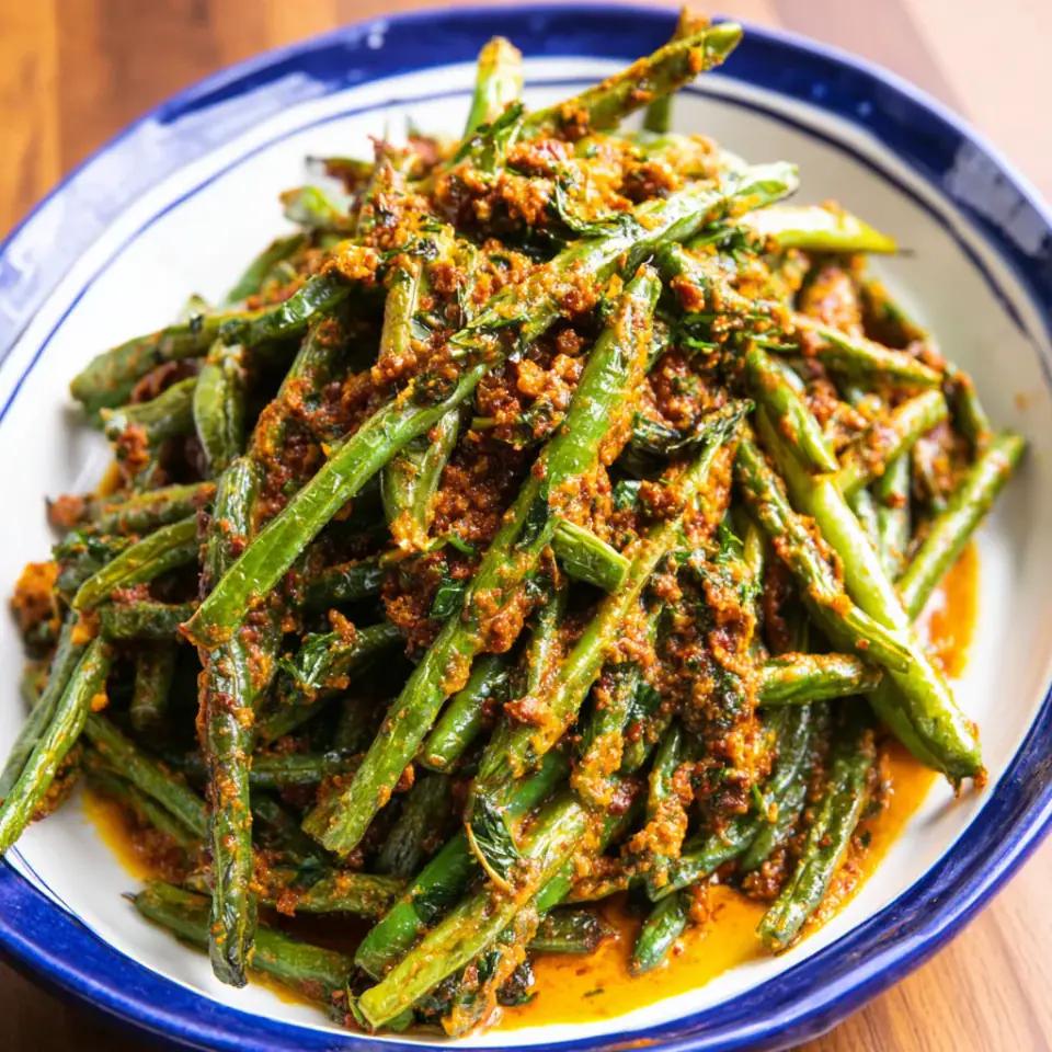Dry-Fried Green Beans With Romesco Sauce Recipe served on the table