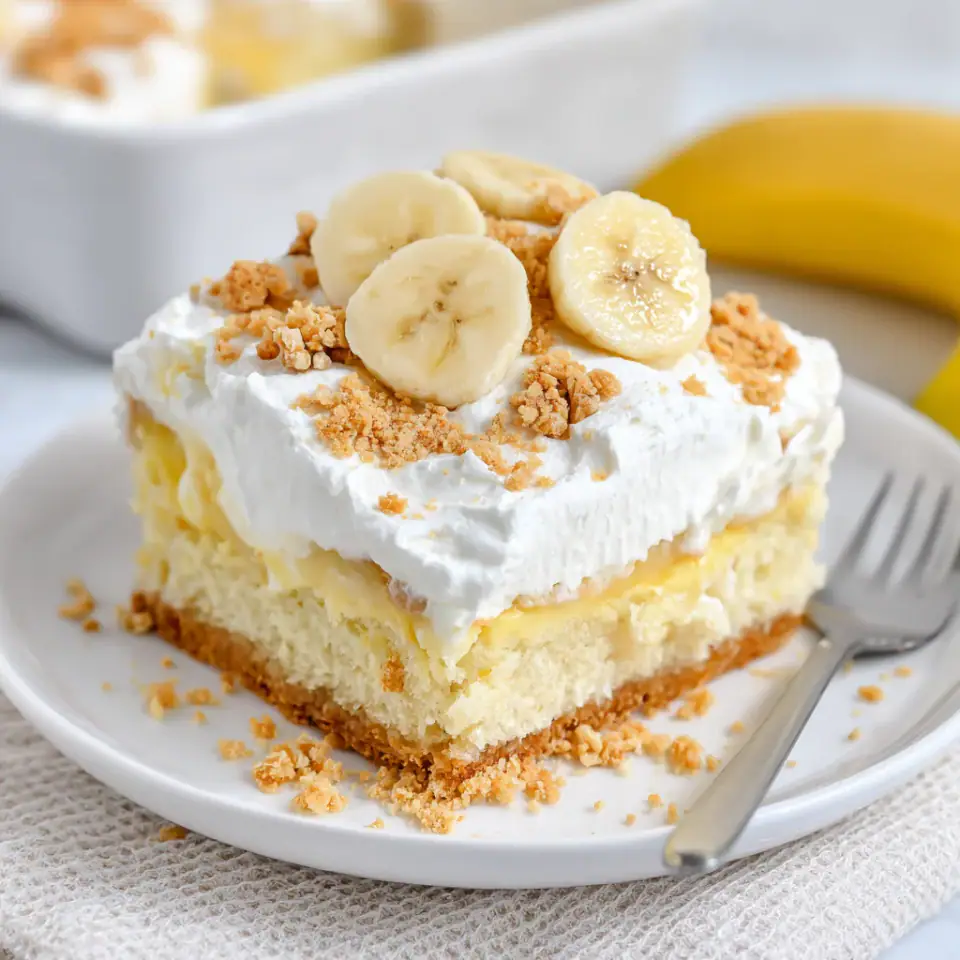 Banana Pudding Poke Cake served on the table