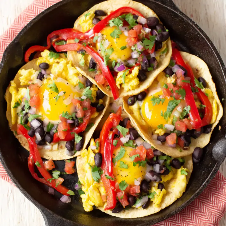 Huevos Rancheros Tacos served on the table