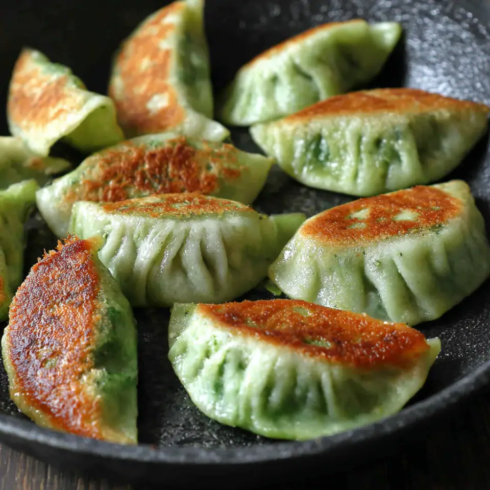 A close look at Pan-fried vegetarian dumplings / potstickers