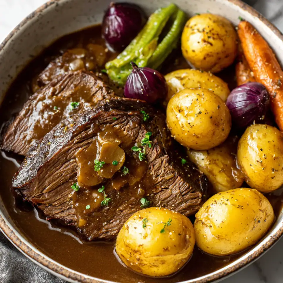 Sauerbraten (German Pot Roast) served on the table